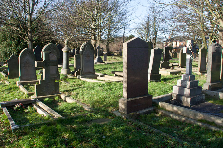 The grave of Corporal Drummond in Usworth (Holy Trinity) Churchyard, - centre in the distance