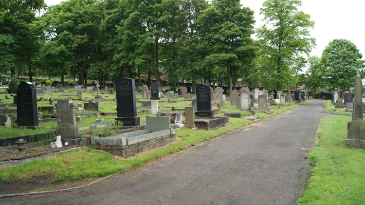A View of Whickham (Garden House) Cemetery. Private T E Finlay's Headstone is centre (white), and Edward Finlay's to the right of it.