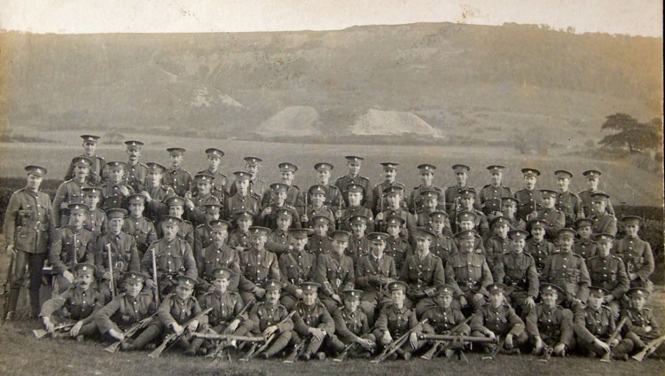 William Stockdale, - 5th from the right in the 3rd row from the front, with a group of soldiers from the Yorkshire Regiment, West Yorkshire Regiment, and Grenadiers. The two instruments in the foreground are range finders. Clearly, this group of men will have been on a course in using range finders.